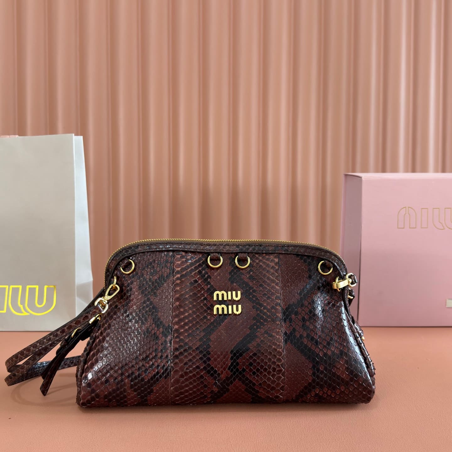 Miu Miu Caprice Tobacco python-print Ayers leather clutch 5BF130 TOP