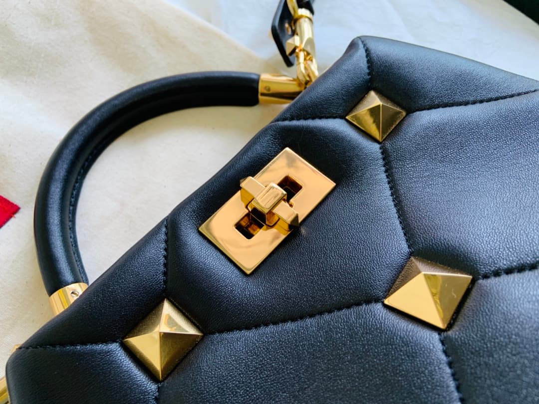 Valentino Garavani Roman Stud leather top handle bag black high