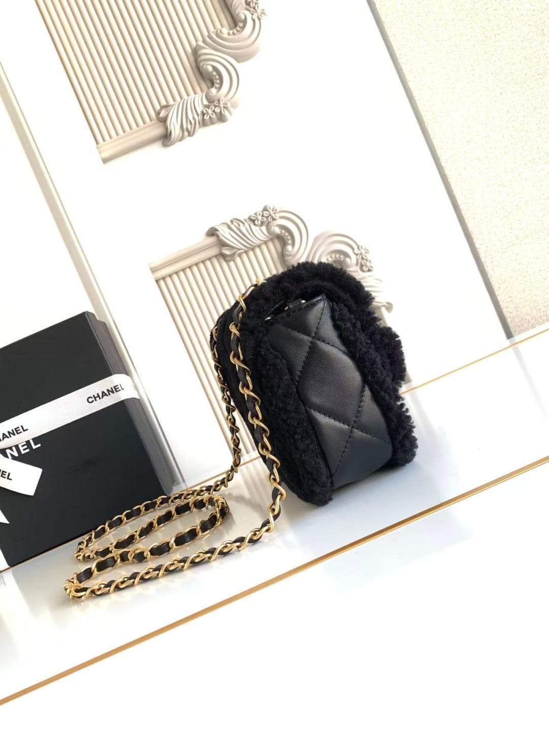 Chanel Mini Shearling Flap Bag in Black lambskin with black shearling & Gold-Tone Metal AS5148 A