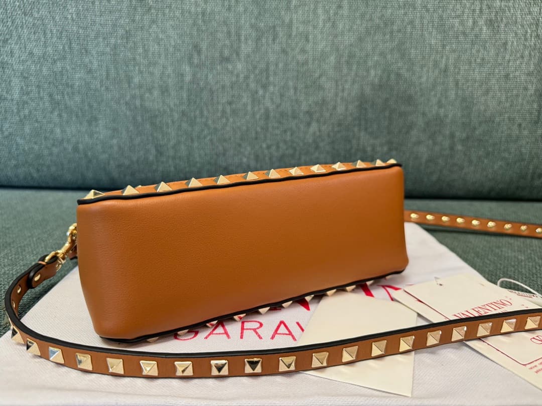 Valentino Garavani Rockstud Raffia and leather crossbody clutch High