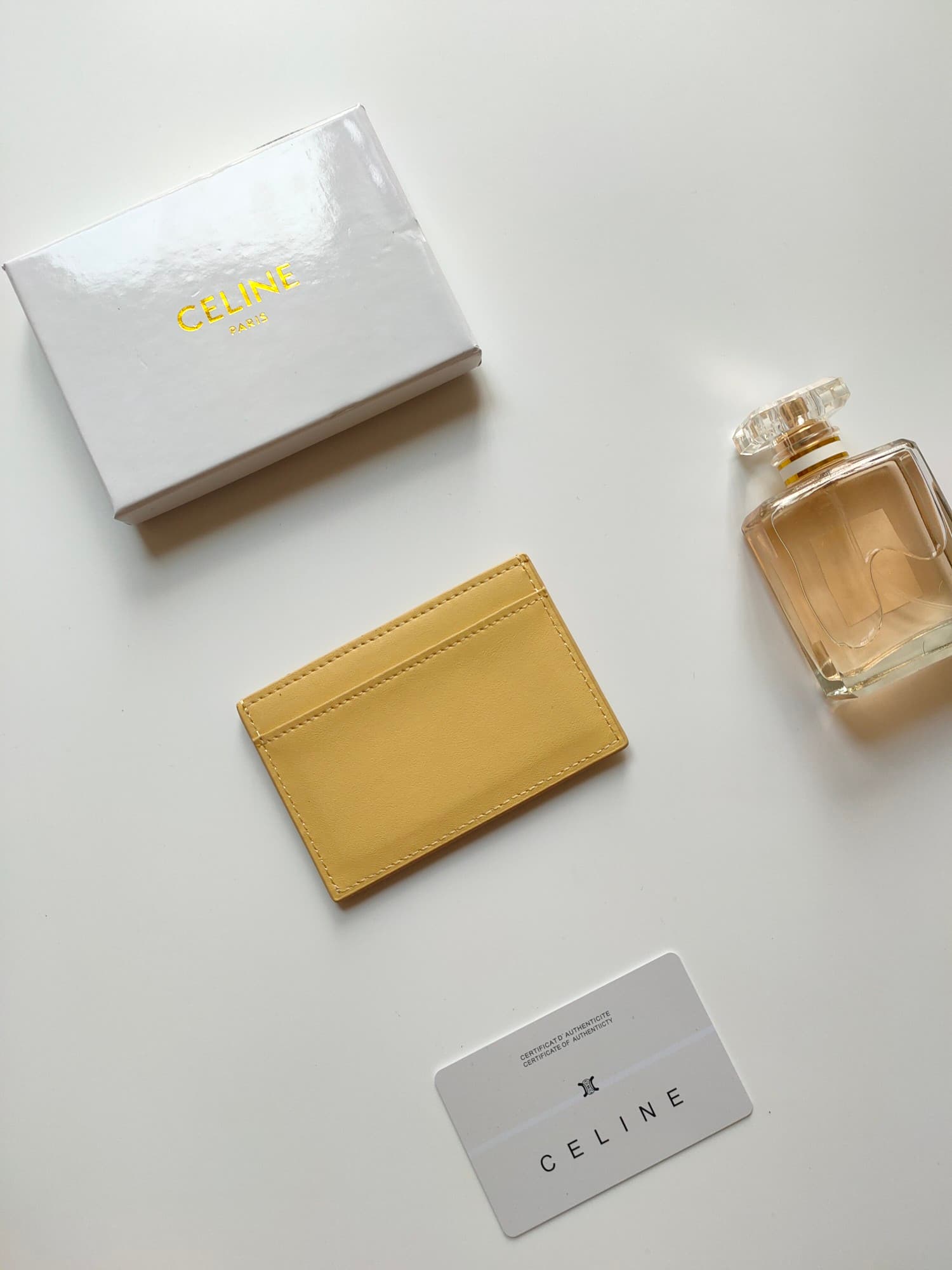 Celine Triomphe card holder in yellow shiny calfskin leather 10B703 High