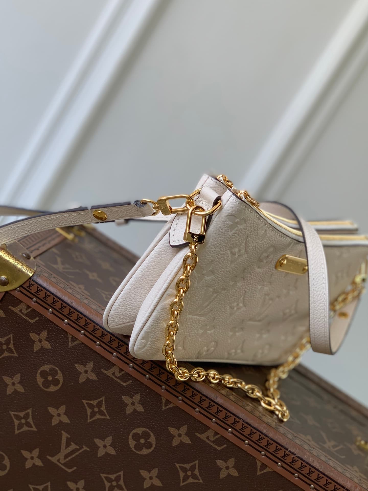 Louis Vuitton Pochette Liv Crème Monogram Empreinte Leather M3A838 High