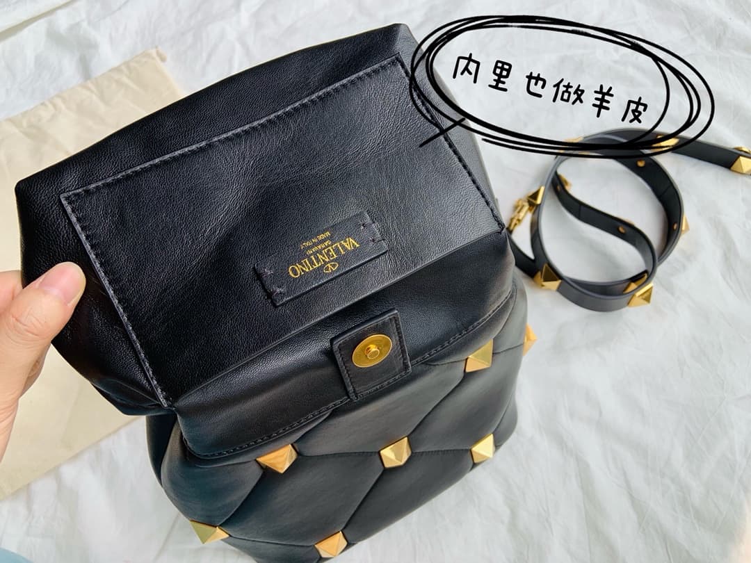 Valentino Garavani Roman Stud leather top handle bag black high