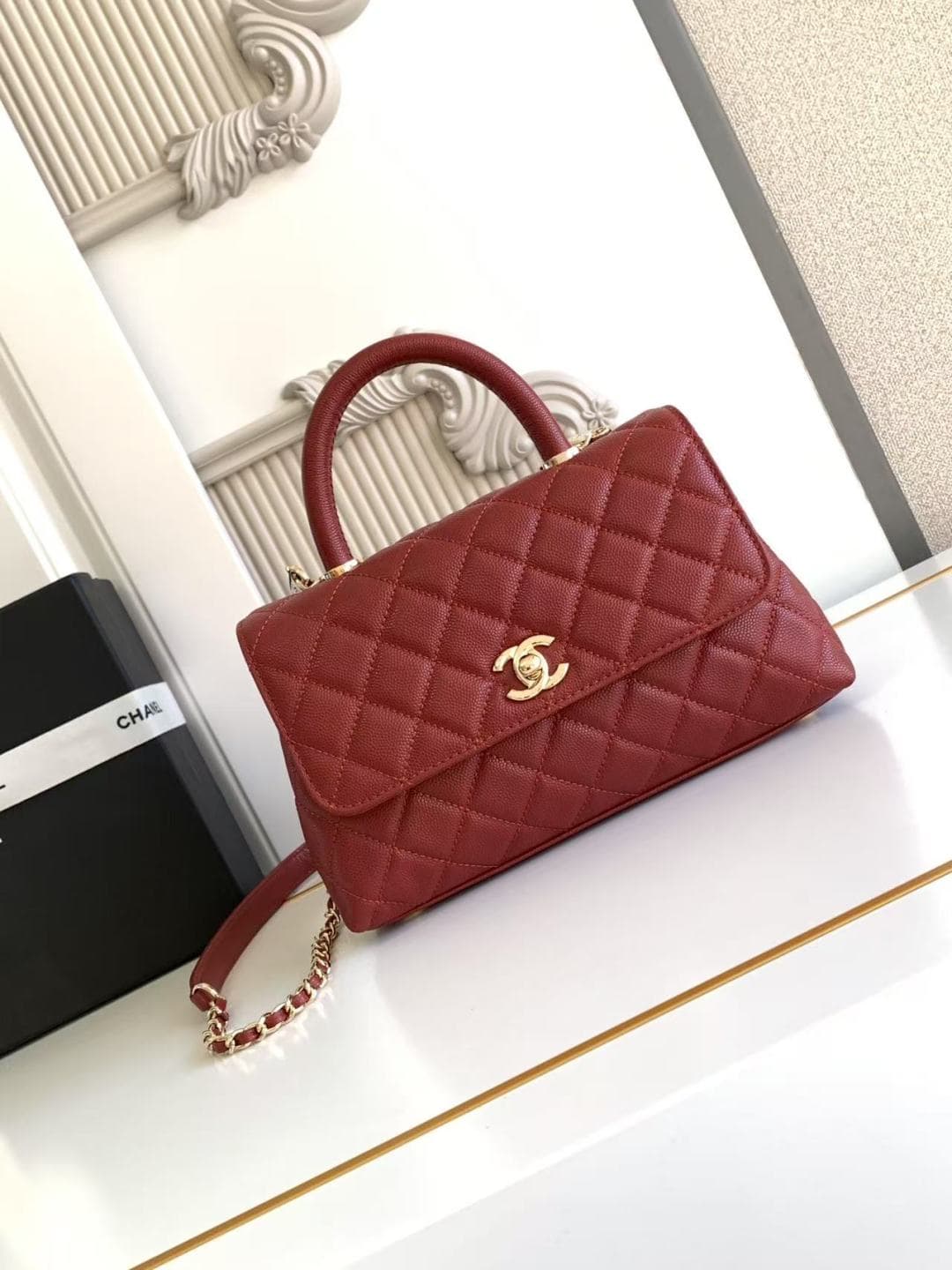 FLAP BAG WITH TOP HANDLE Grained Calfskin & Gold-Tone Metal A92990 Red Binding A