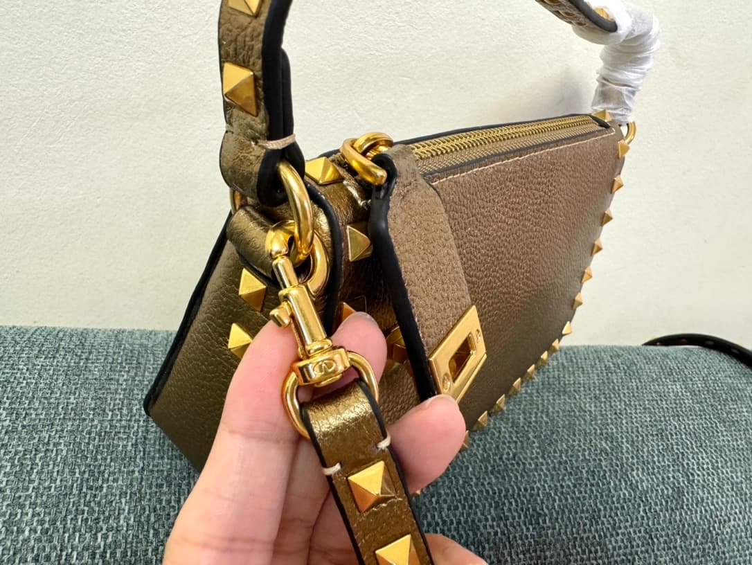 Valentino Garavani Mini Rockstud crossbody bag in Gold Grained Metallic Leather High