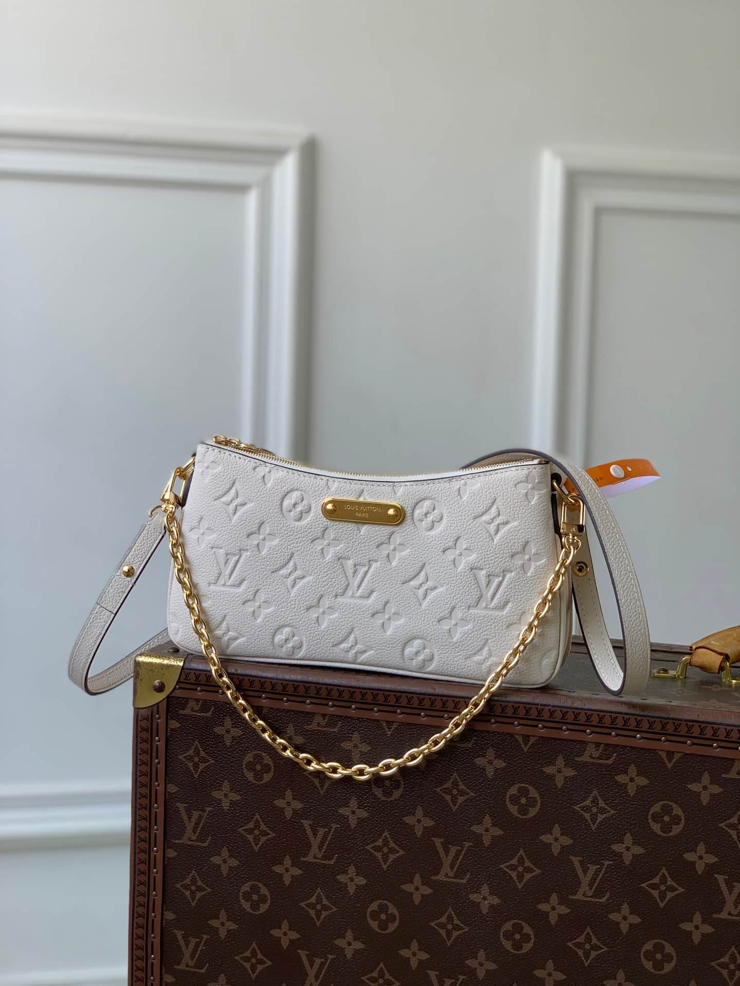 Louis Vuitton Pochette Liv Crème Monogram Empreinte Leather M3A838 High