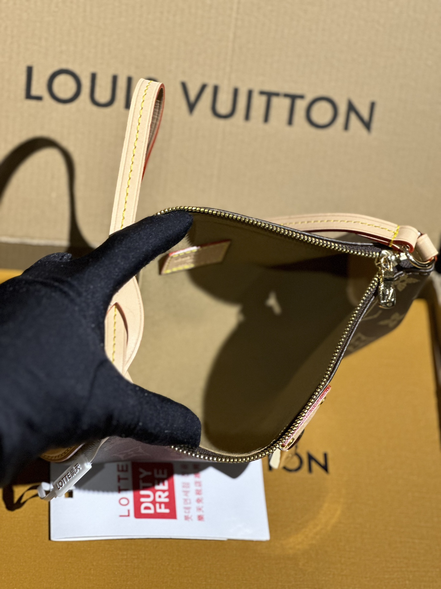 Louis Vuitton Pochette Tirette Monogram coated canvas M12859 High