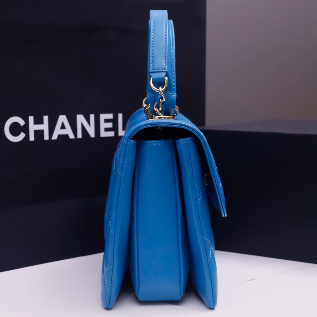 SMALL FLAP BAG WITH TOP HANDLE Lambskin Gold Metal Blue A
