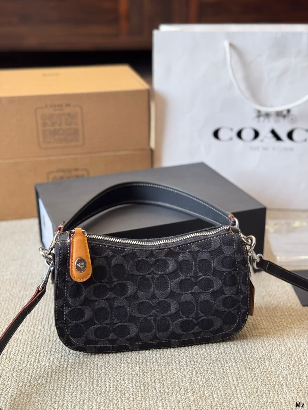 Coach Swinger In Signature Denim