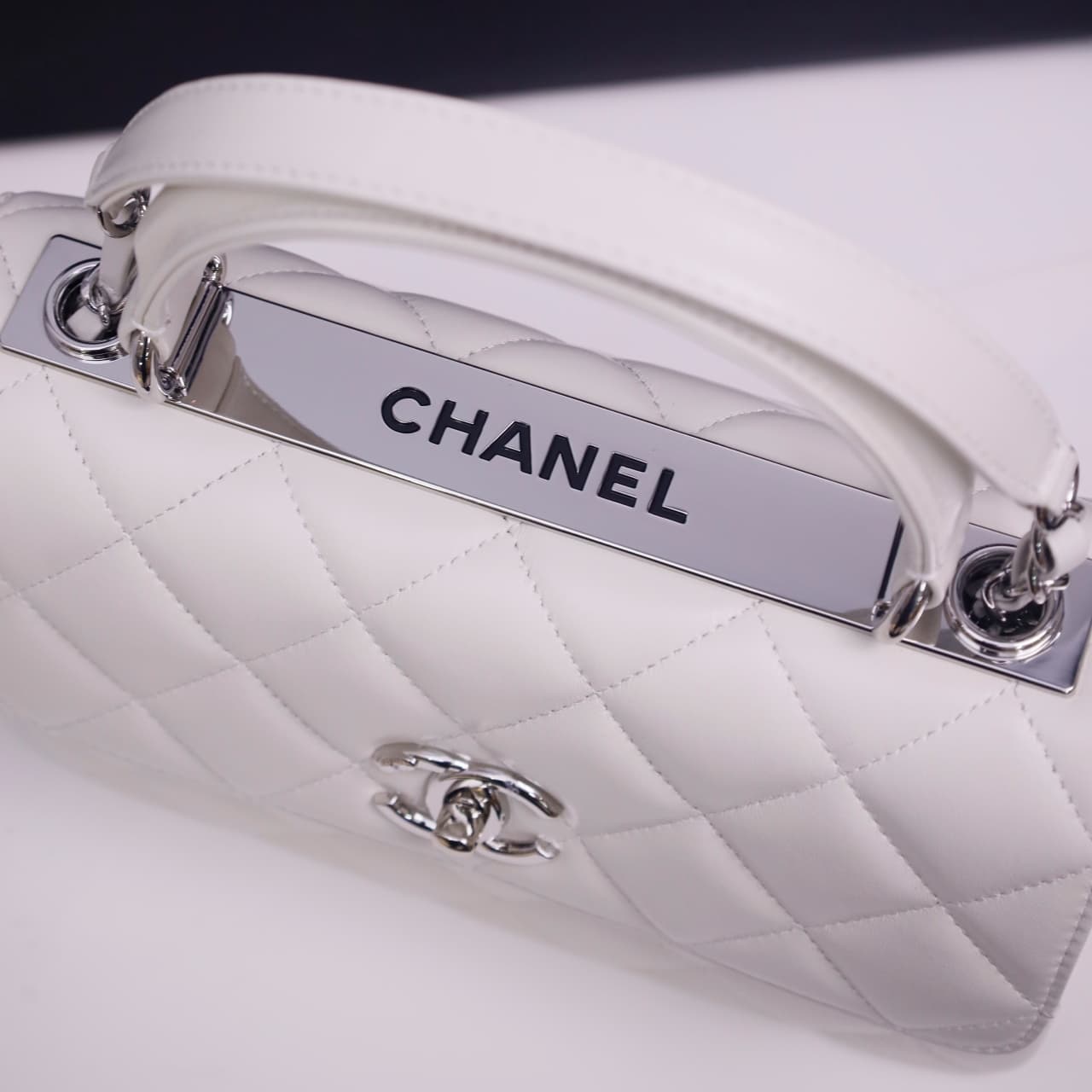 SMALL FLAP BAG WITH TOP HANDLE Lambskin Silver Metal White A