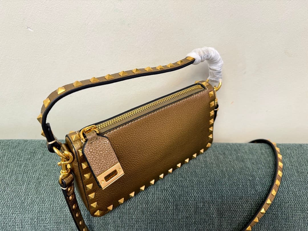 Valentino Garavani Mini Rockstud crossbody bag in Gold Grained Metallic Leather High