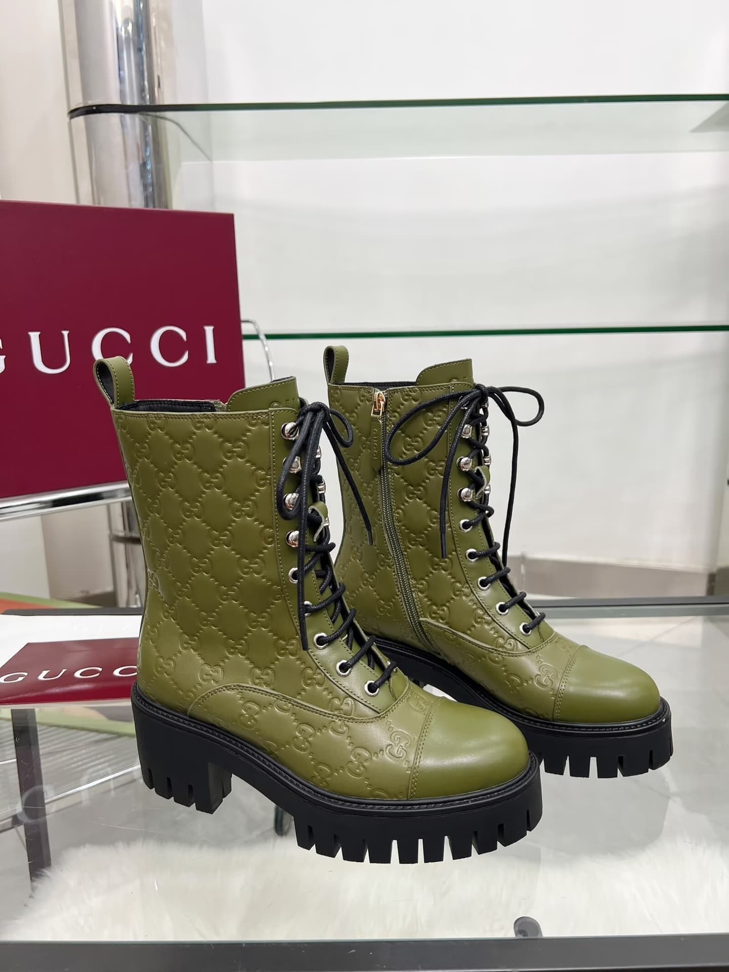 Gucci Women's lace-up ankle boots with GG
