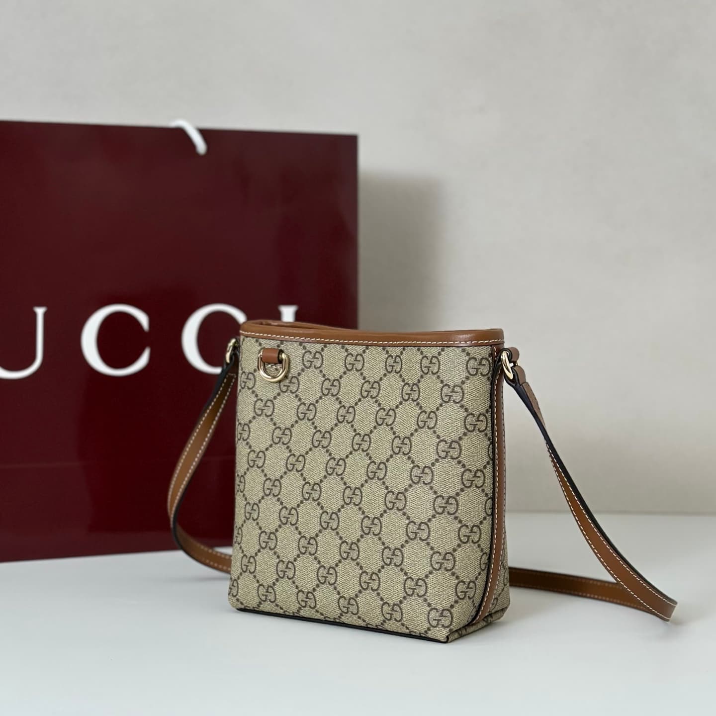 Gucci GG Emblem nano bucket bag 847090 beige and dark brown fabric High