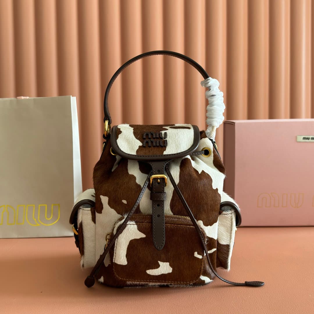 Miu Miu Calf Hair Backpack in brown and white cow print 5BZ043 TOP