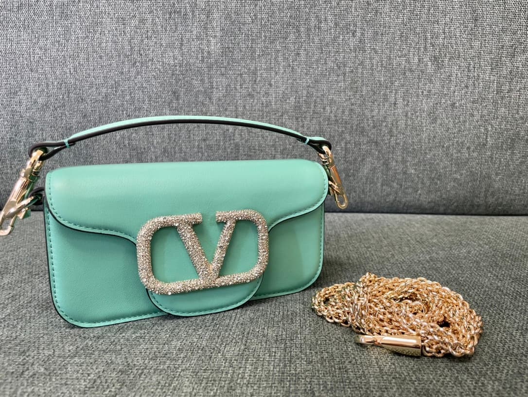Valentino Garavani Locò Mini leather shoulder bag with crystal VLogo High