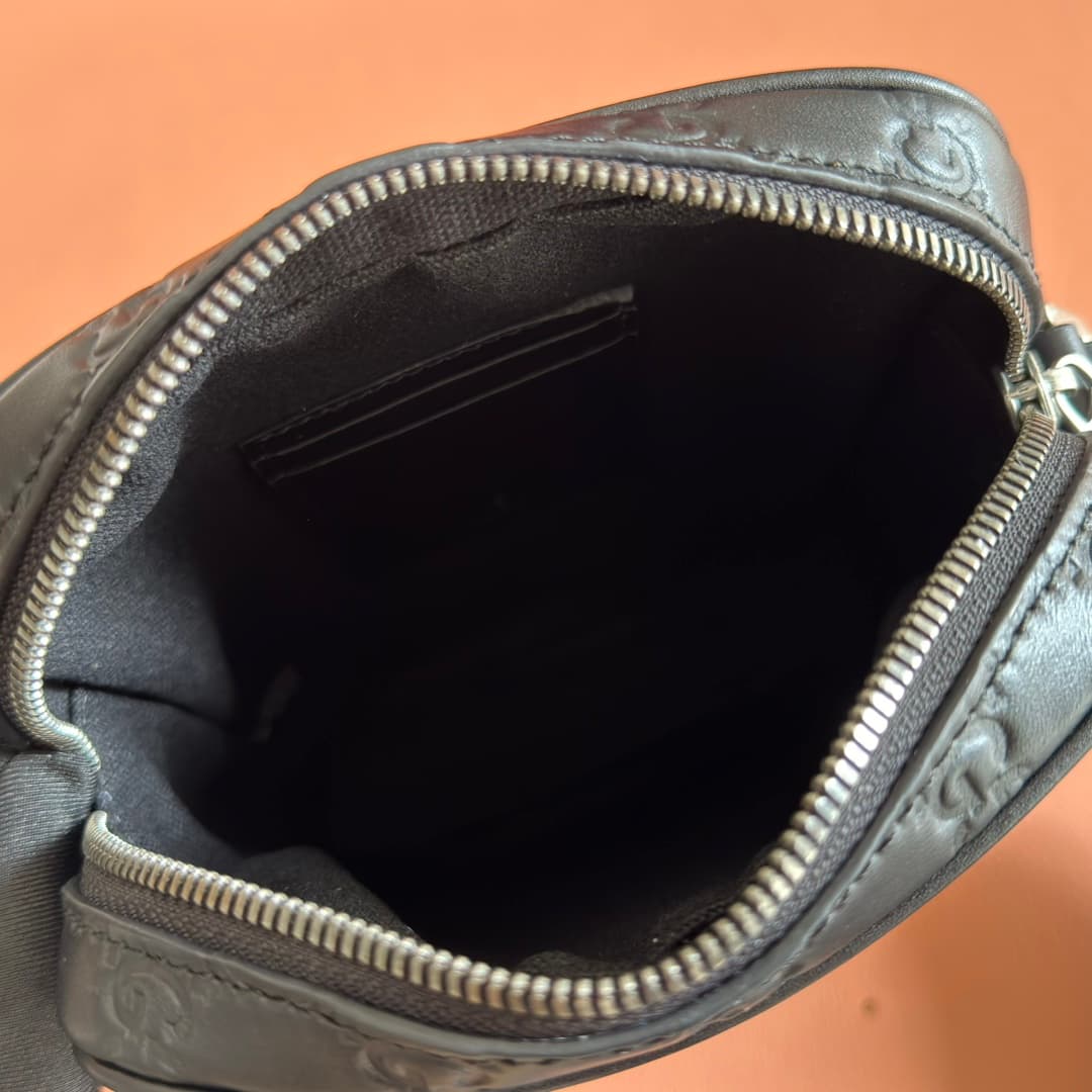 Gucci GG Emblem small crossbody bag Black embossed GG smooth leather 850238 High