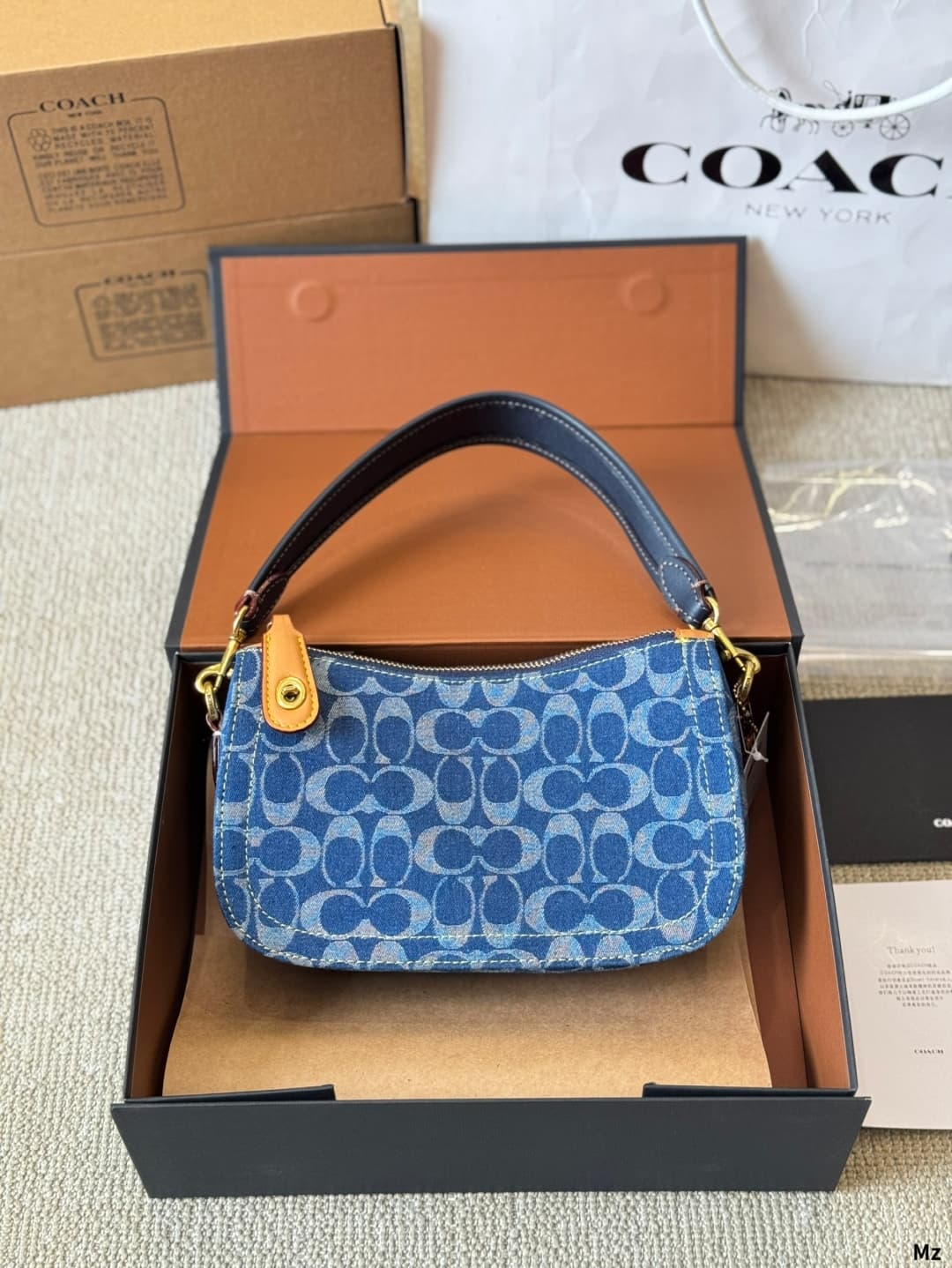 Coach Swinger In Signature Denim