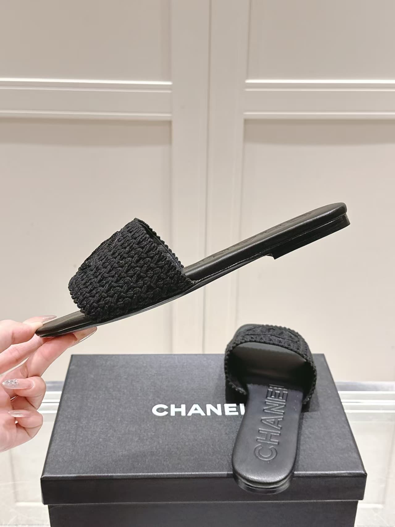 Chanel black crochet CC mules