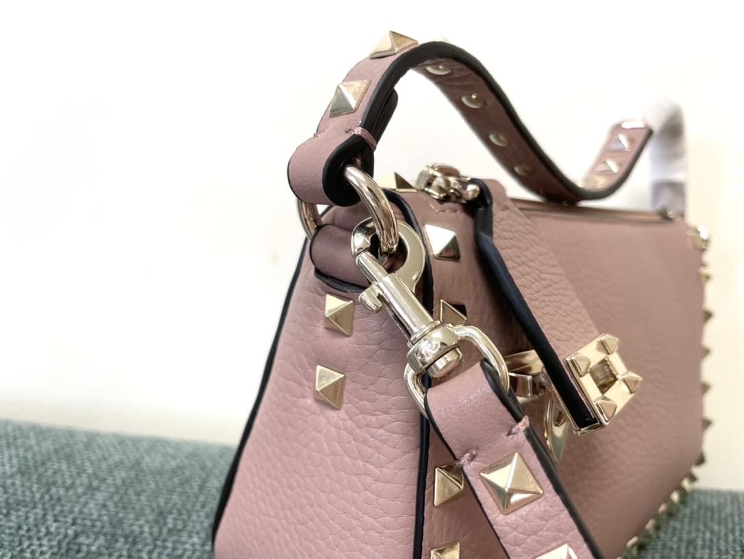 Valentino Garavani Mini Rockstud crossbody bag in powder pink Grained Calfskin High
