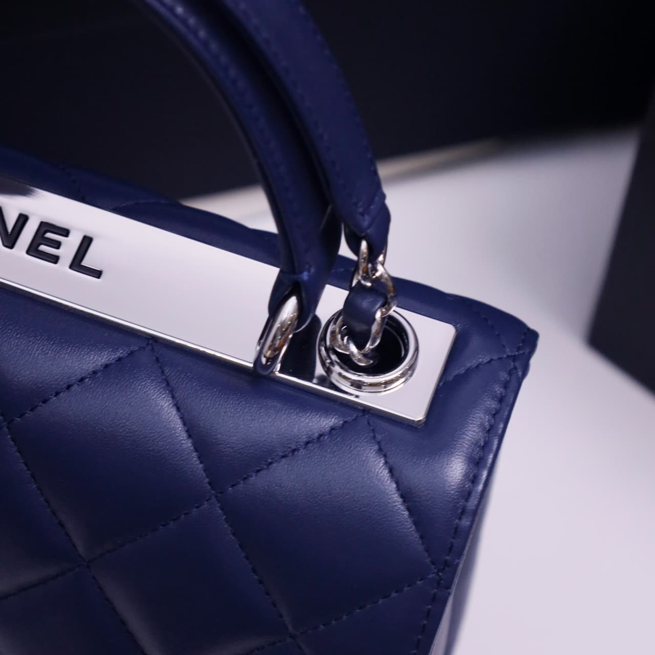 SMALL FLAP BAG WITH TOP HANDLE Lambskin Silver Metal Drak Blue A