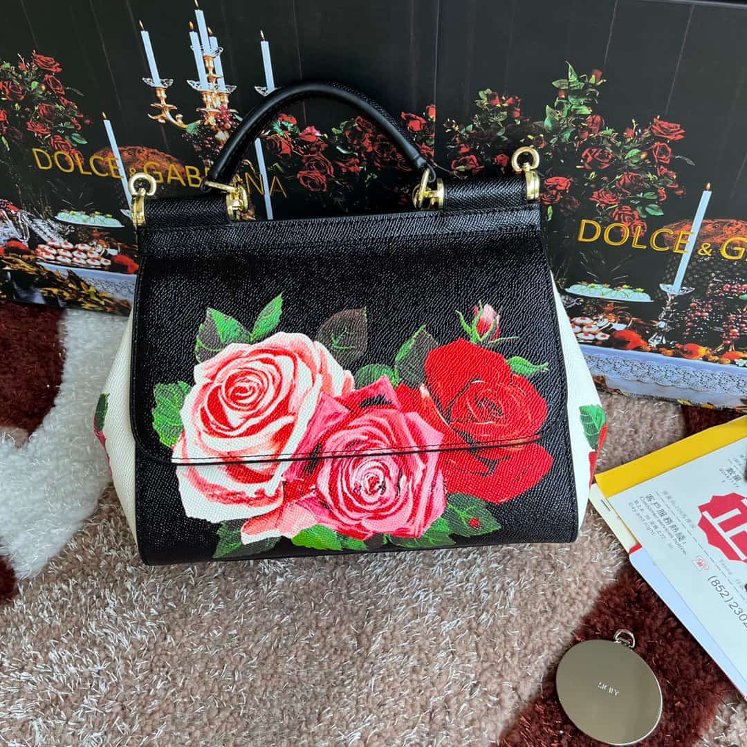 Dolce & Gabbana Miss Sicily top handle bag with vibrant red rose print leather High
