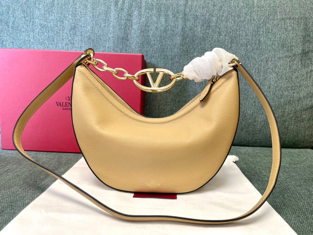 Valentino Garavani VLogo Moon small hobo bag in beige grained calfskin High
