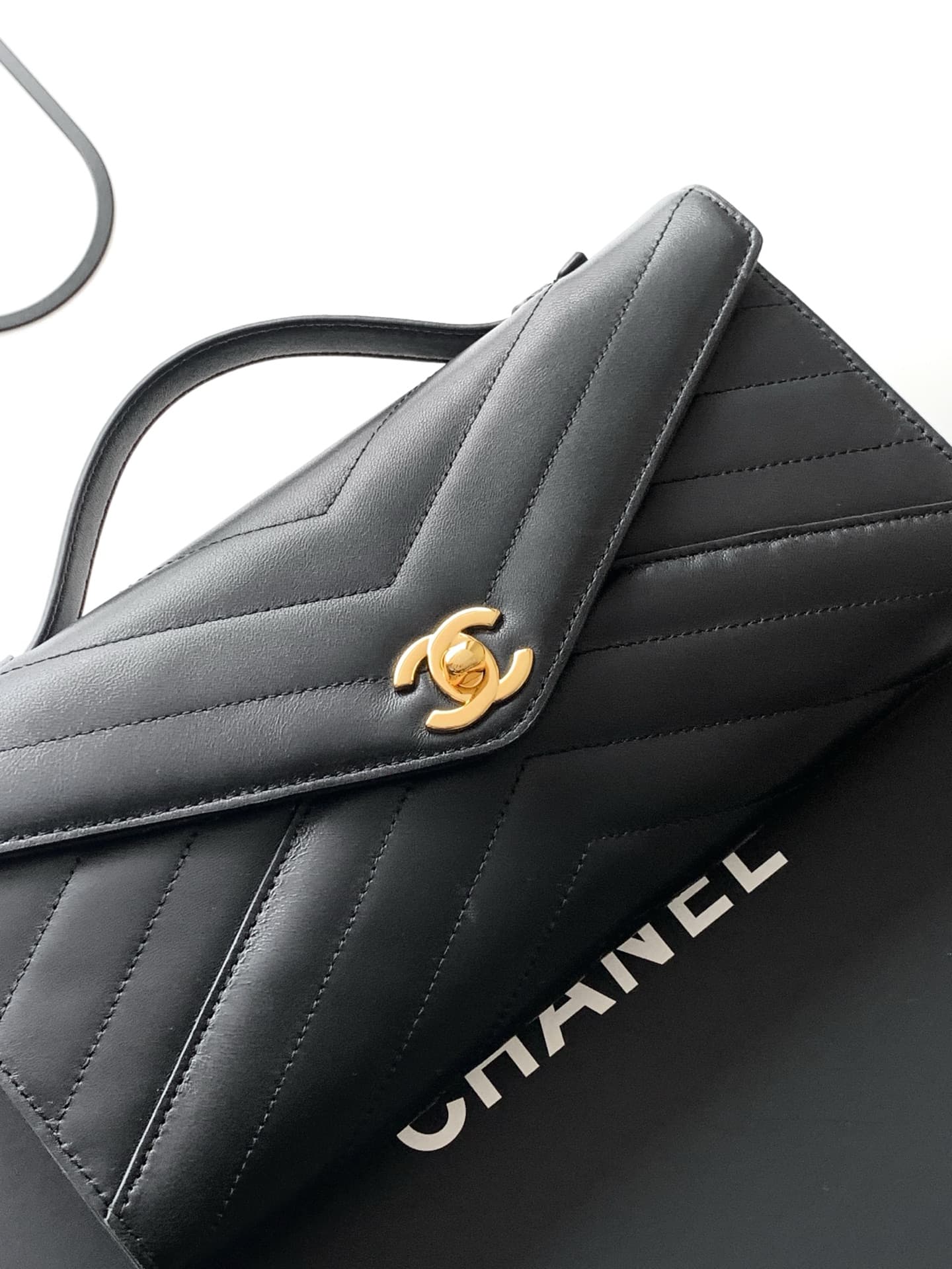 Chanel Flap Bag with Top Handle Chevron Calfskin & Gold-Tone Metal Black AS6044 A