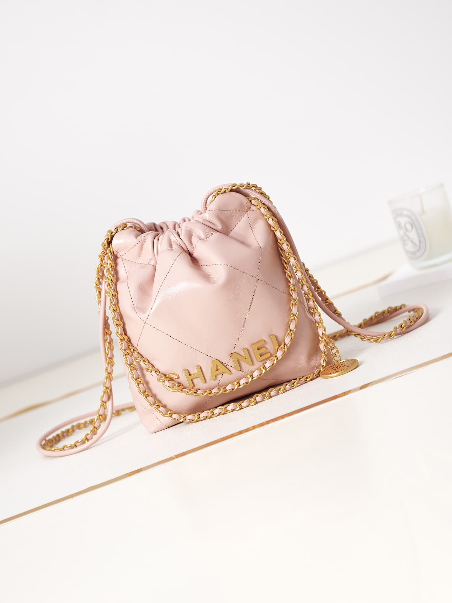 Chanel 22 MINI HANDBAG Shiny Calfskin Pink & Gold-Tone Metal AS3980 A