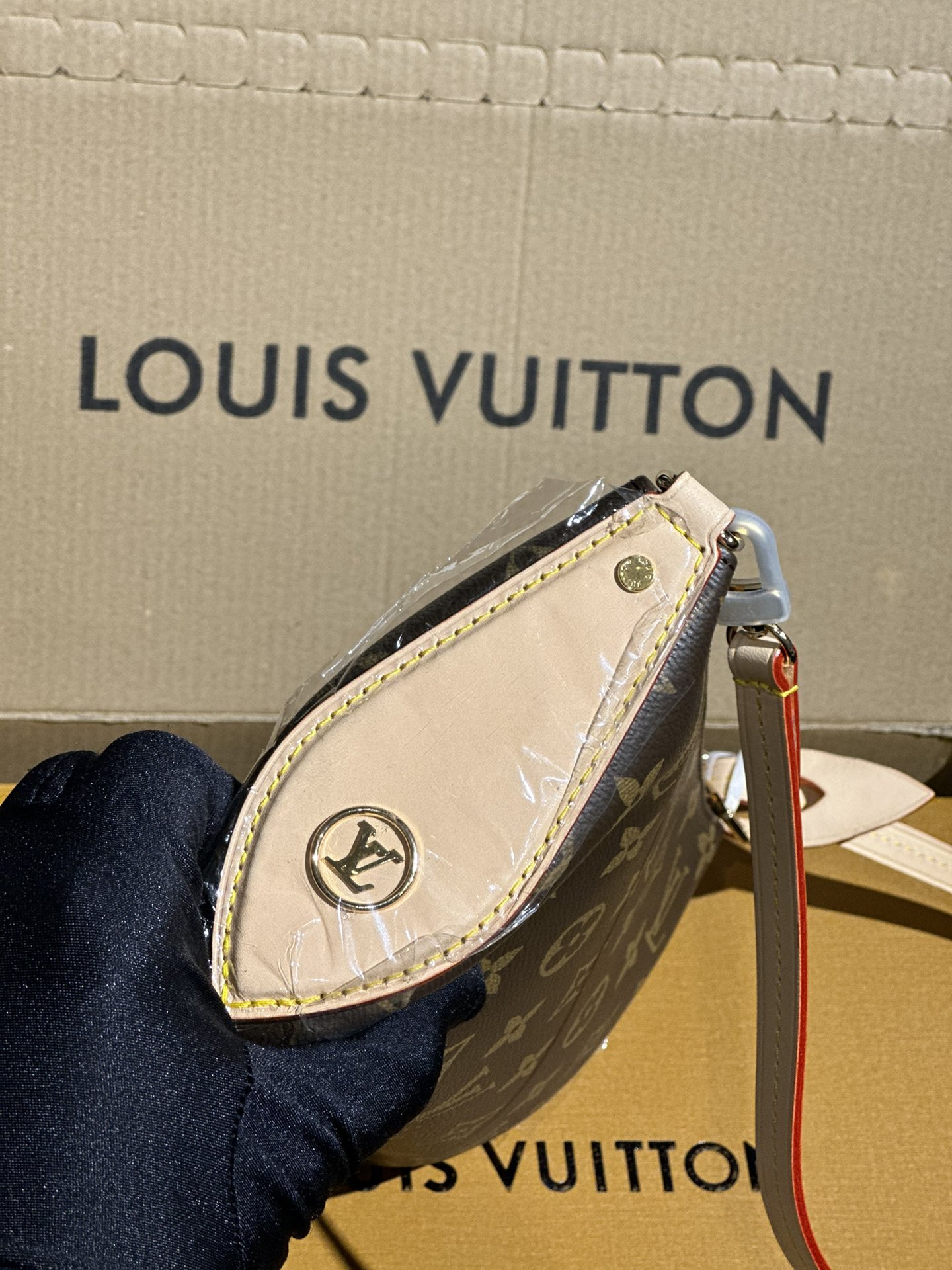 Louis Vuitton Pochette Tirette Monogram coated canvas M12859 High