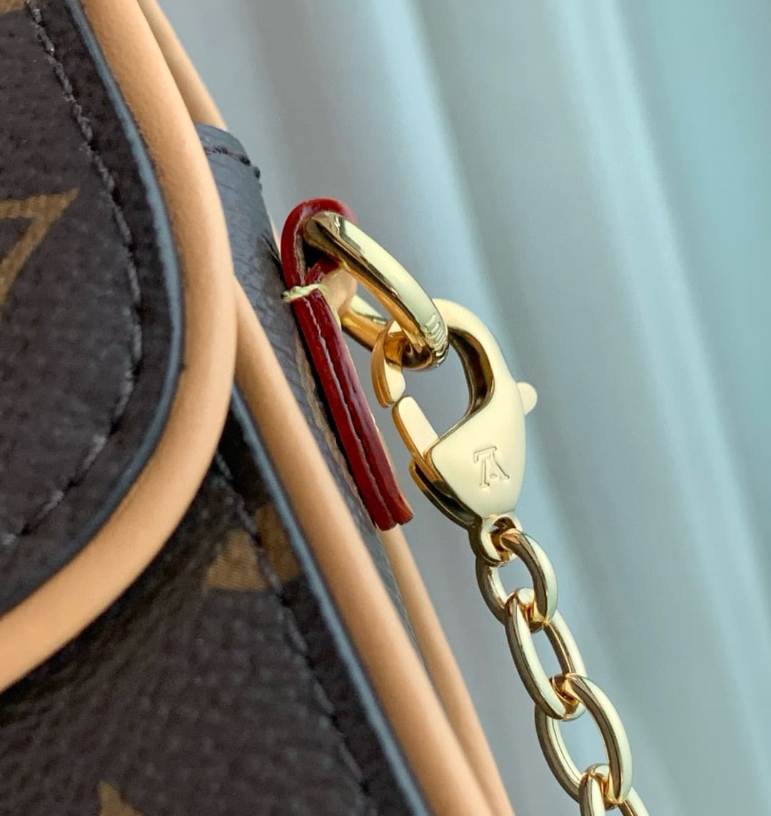 Louis Vuitton Pochette Camille in Monogram Canvas M13566 High