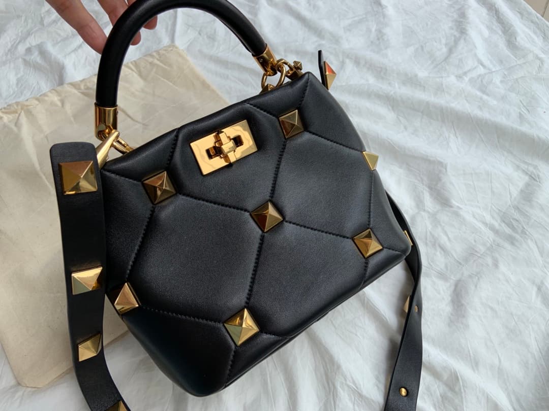 Valentino Garavani Roman Stud leather top handle bag black high
