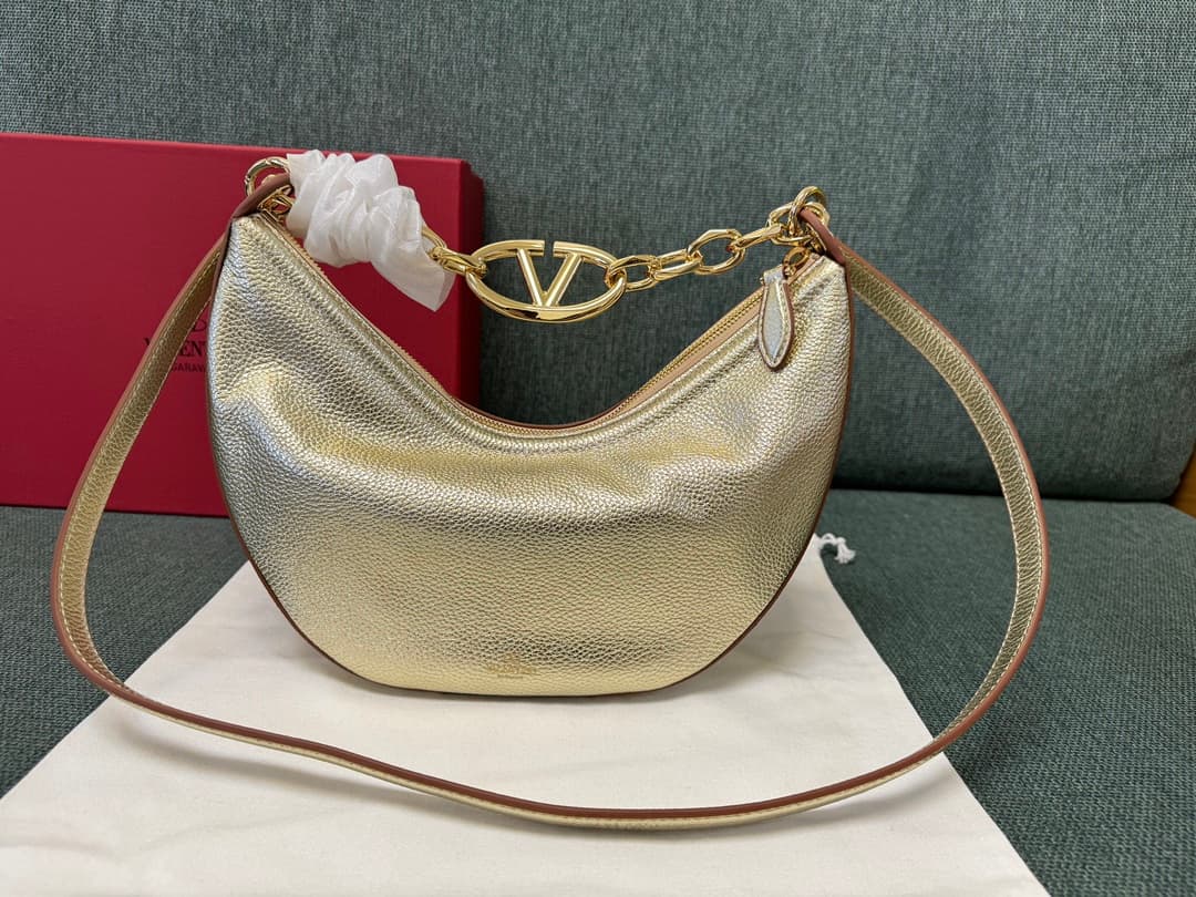 Valentino Garavani VLogo Moon small hobo bag in Gold grained calfskin High