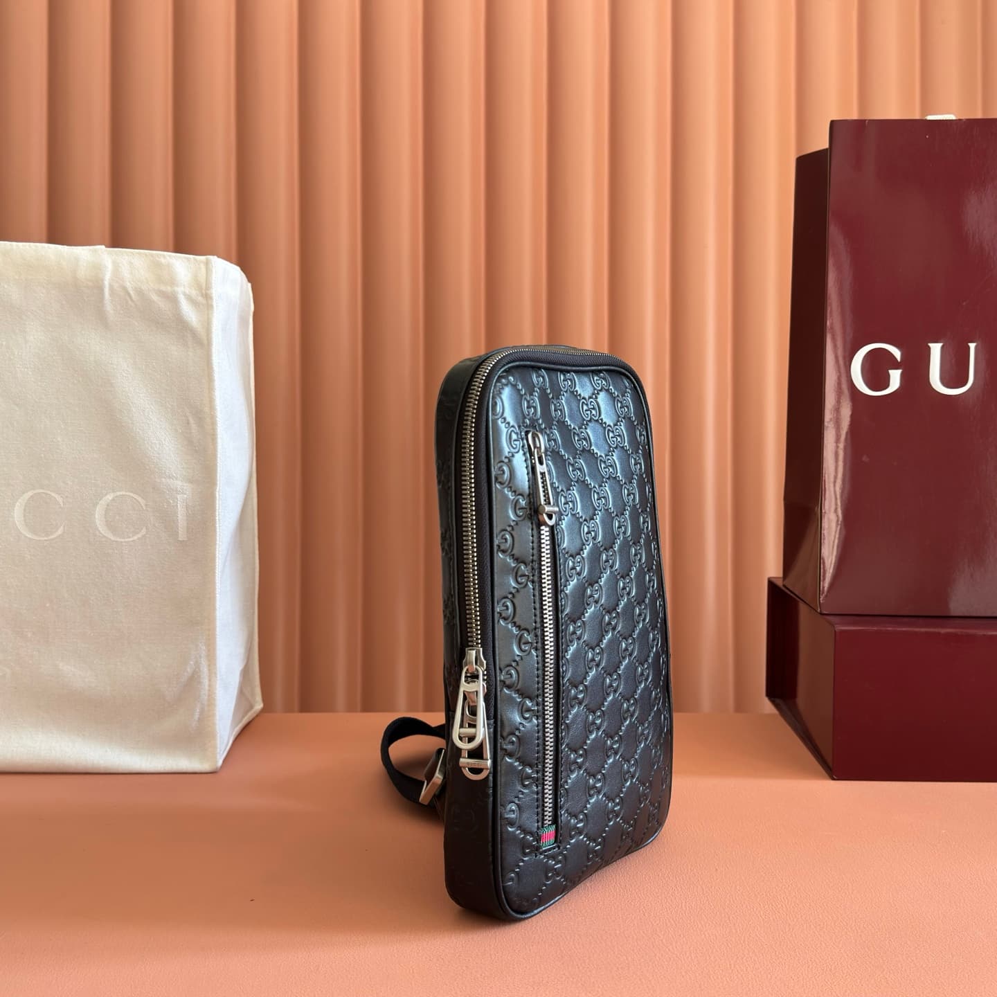 Gucci GG Emblem small crossbody bag Black embossed GG smooth leather 862915 High